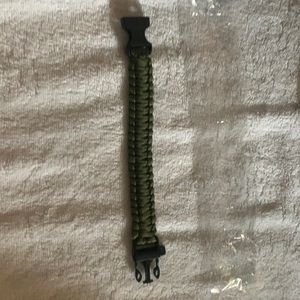 Bracelet with cord material brand new in bag khaki